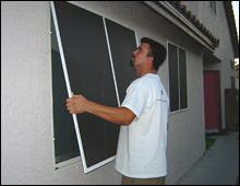 Installing solar screens on a residential window